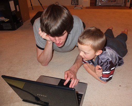 Dillon and Lucius play computer game